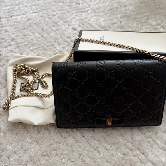 Gucci Black Embossed GG Leather Crossbody with Gold-Tone Clasp - Picture 2 of 2